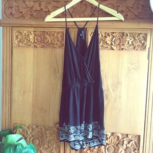 Black romper with white lace detail